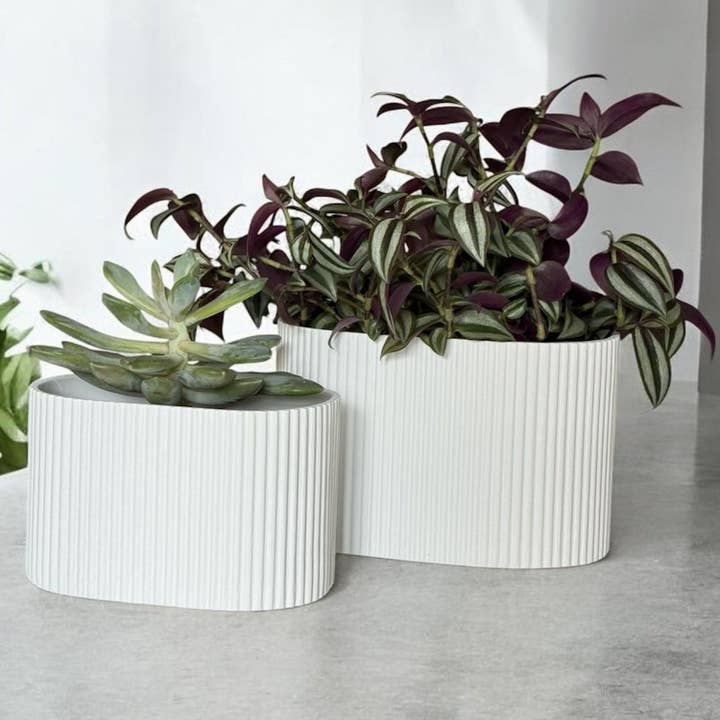 Flutini | White Fluted Oval Stone Resin Indoor Plant Pots (2 Pot Set) for wholesale by Jobu Home