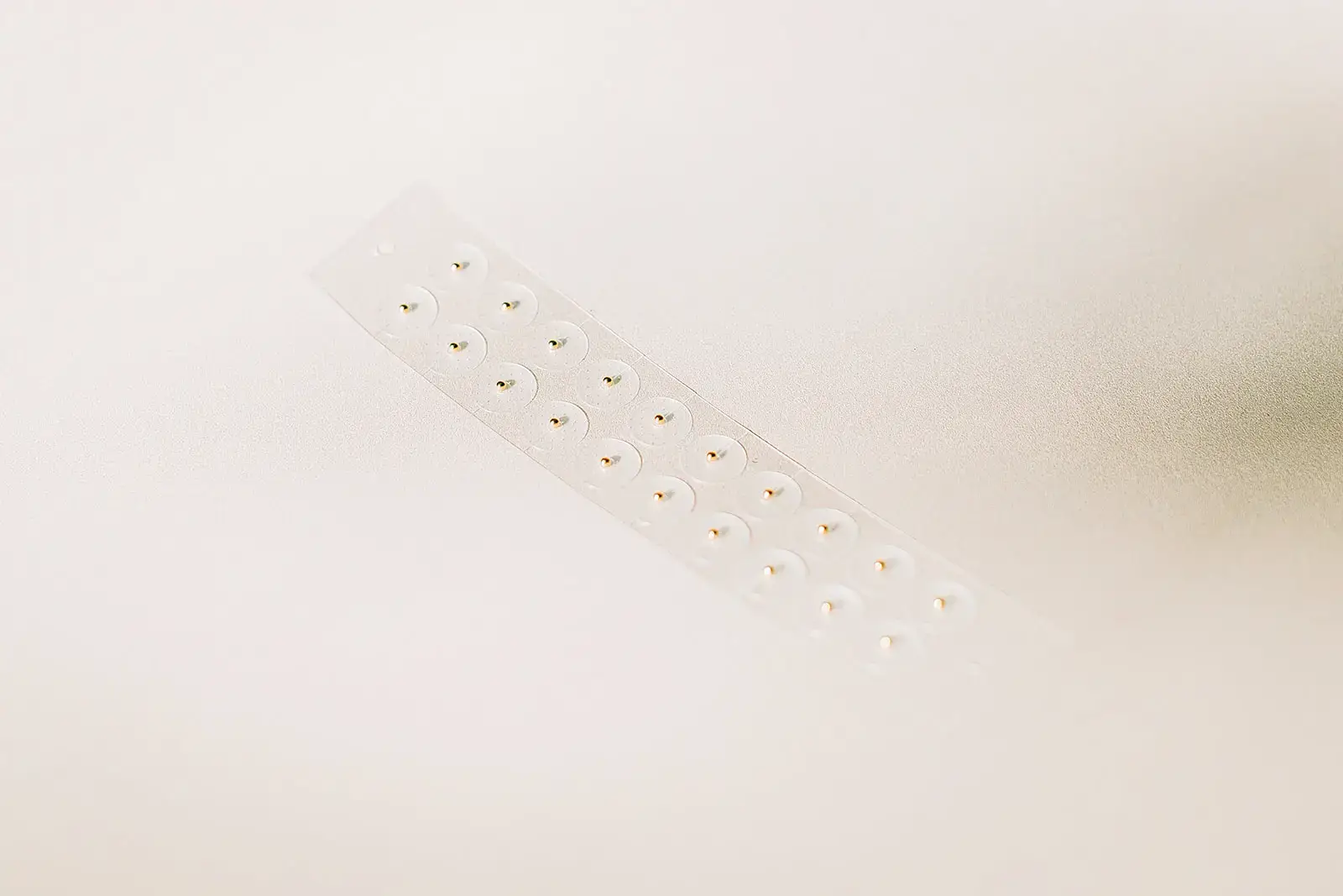 NAO Wellness - Wholesale Acupuncture Supplies - 24K Gold Ear Seed Strips in Bulk @ Wholesale Prices1