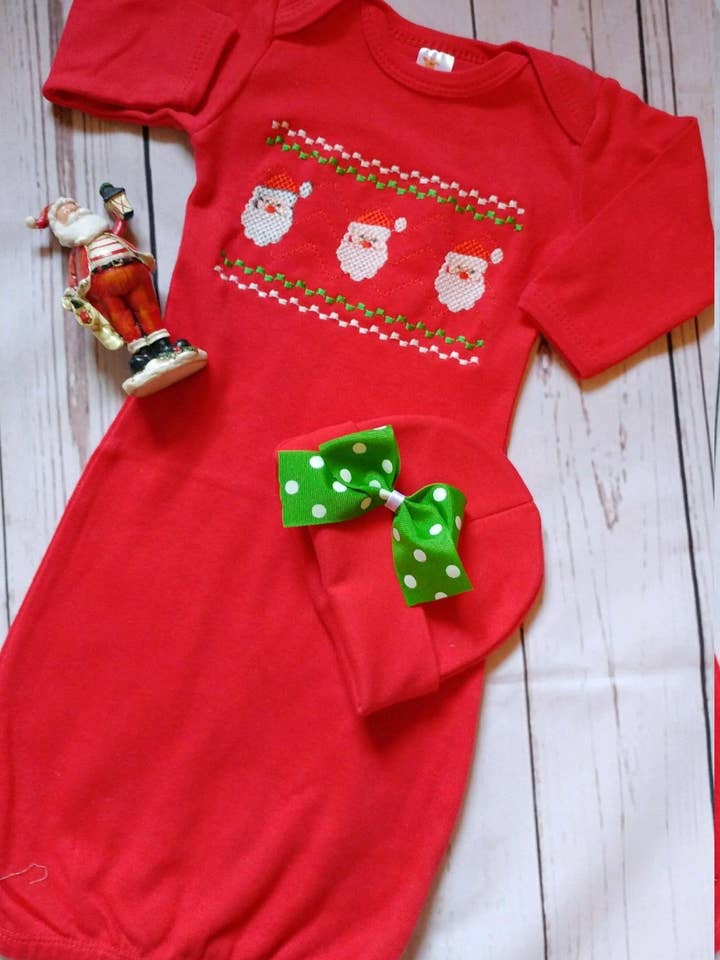 Baby Girl Christmas Faux Smocked Santa Gown with Beanie for wholesale by The Posh Layette