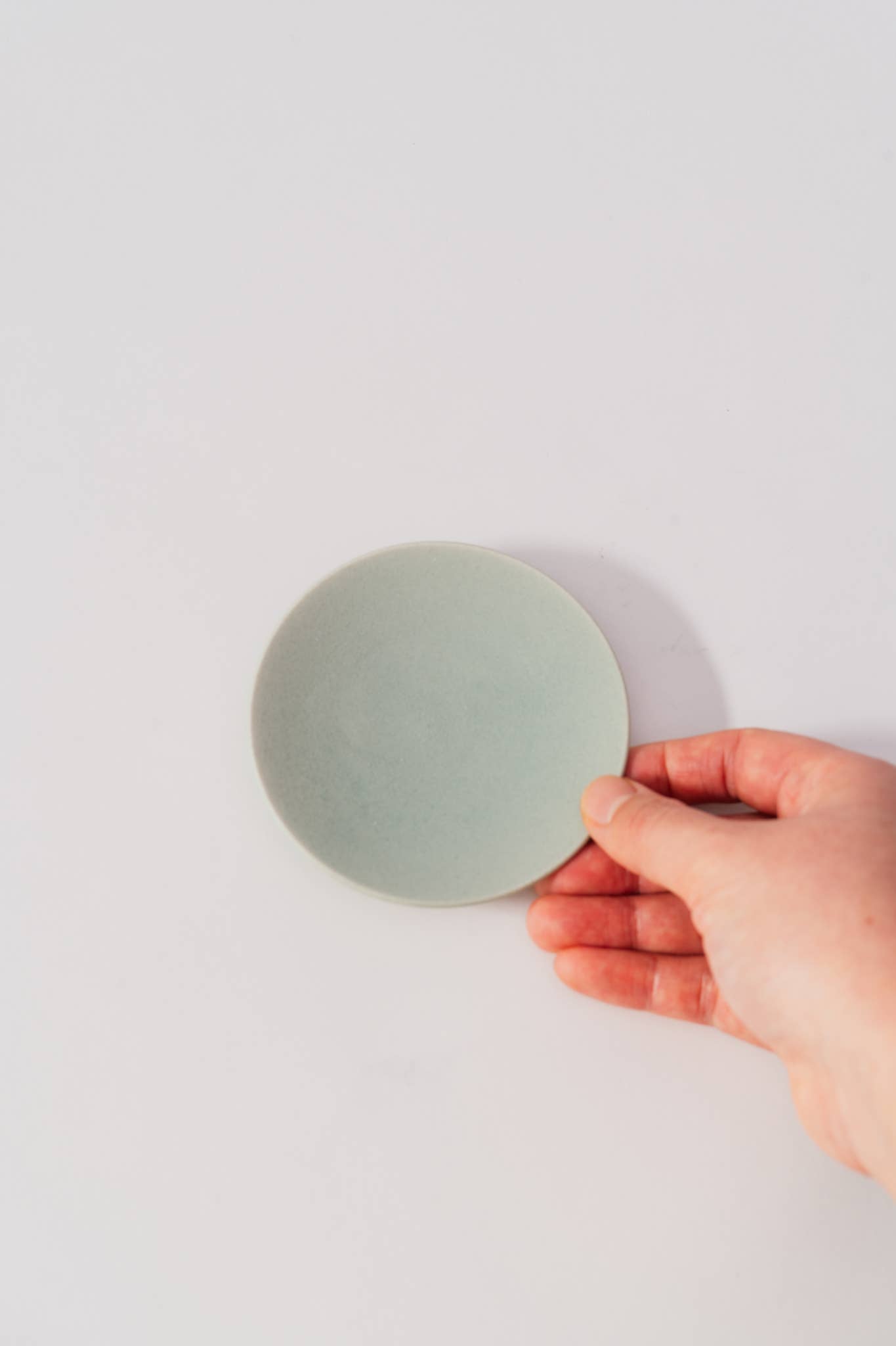 Light Blue Mino Ware "Obanzai" Mini Plate Moon for wholesale on Faire1