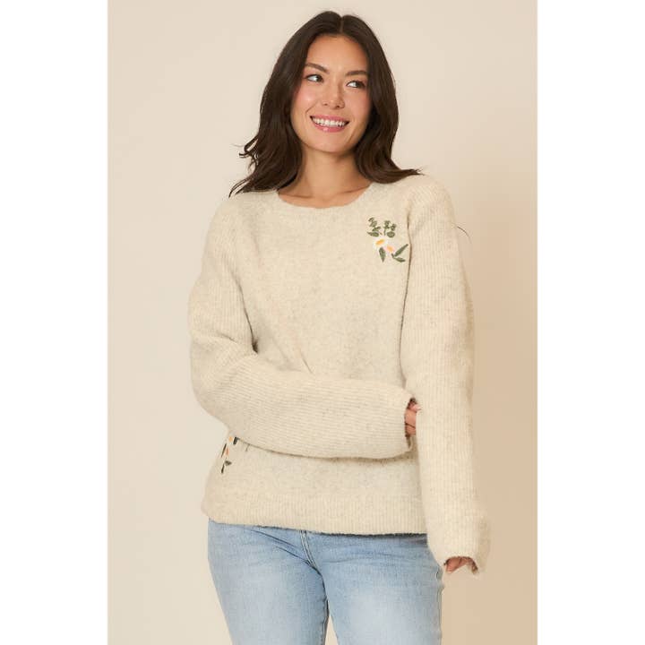 Pull en maille double brodé de fleurs pour la vente par Cozy Casual, Inc.