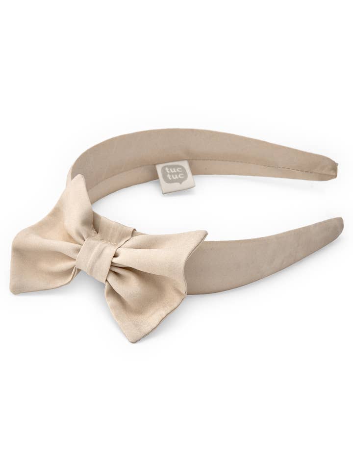 Diadema de niña en beige con gran lazo decorativo para venta al por mayor de tuc tuc