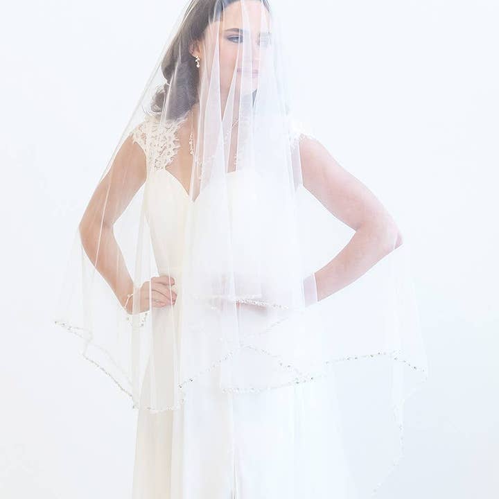 Two Layer or One LayerCrystal Edge Wedding Veil with Blusher and other Purchase Wholesale beads sequins. Free Returns & Net 60 Terms on Faire trending on Faire.