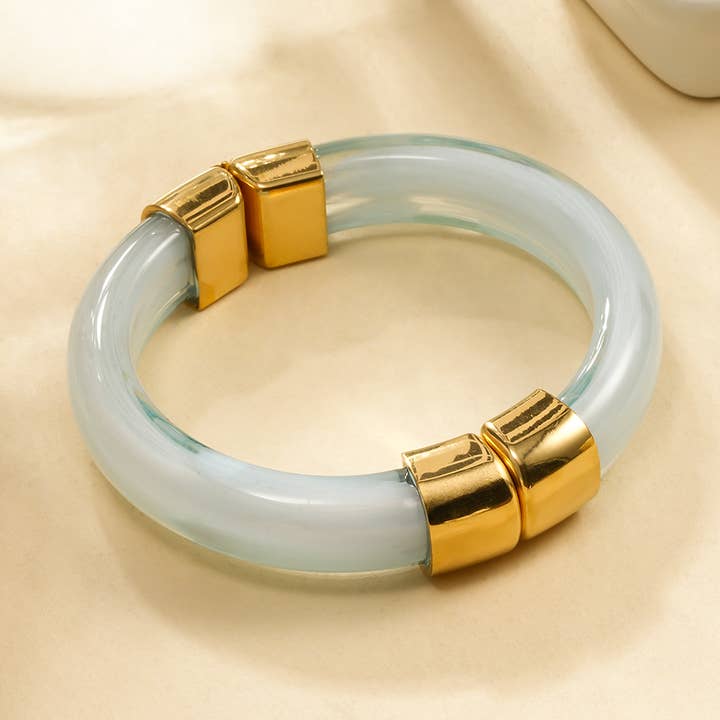 Bracciale rigido magnetico in resina blu apribile per la vendita all'ingrosso da parte di JOYA