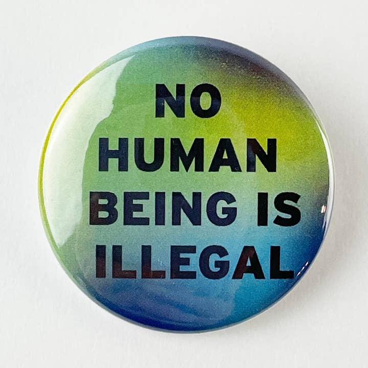 No Human Being Is Illegal Pinback Button for wholesale by Culture Flock