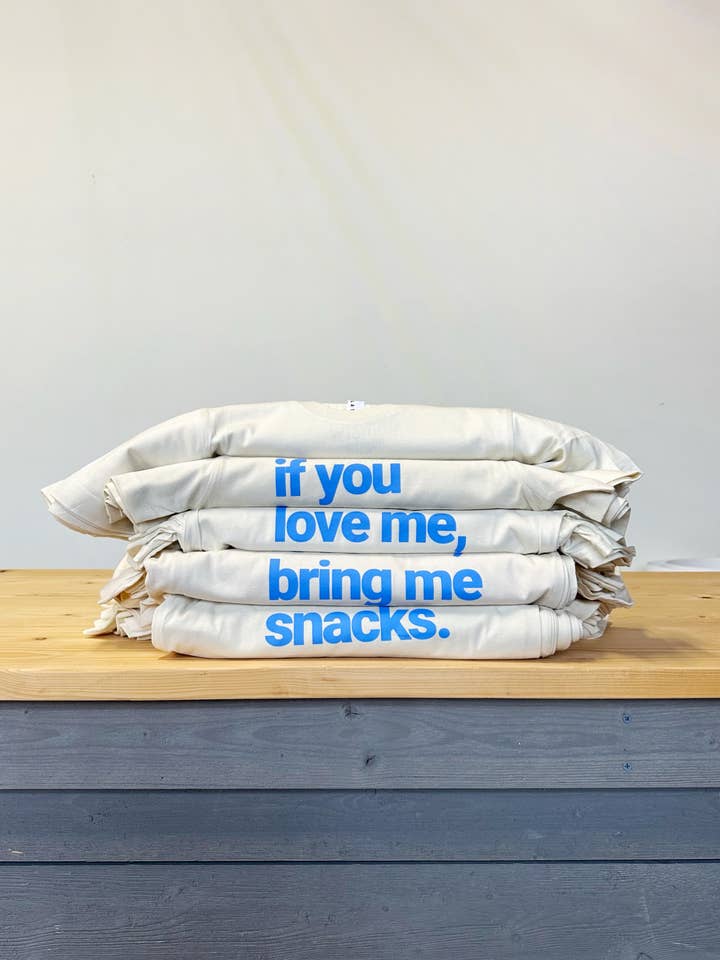 If you love me, bring me snacks Tee for Kids and Adults for wholesale by The Wishing Elephant