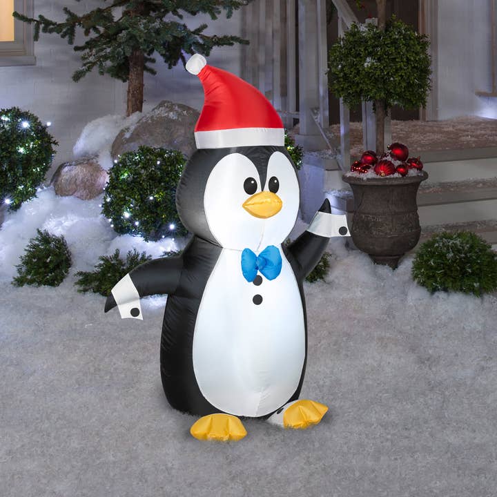 National Tree Company - Wholesale Inflatables - 4 ft. Inflatable Waving Penguin with LED Lights1