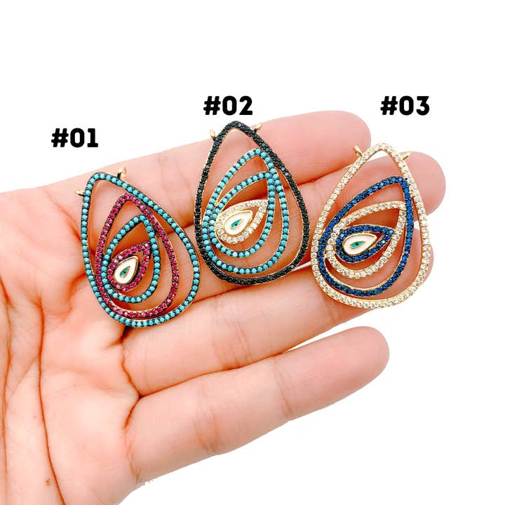 Connettore CN334 con ciondolo a forma di goccia in micro pavé dorato per la vendita all'ingrosso da parte di Beads Creation