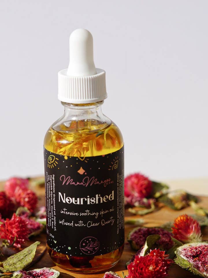 NOURISHED - crystal infused healing skin oil for wholesale by Mama Mangos Care