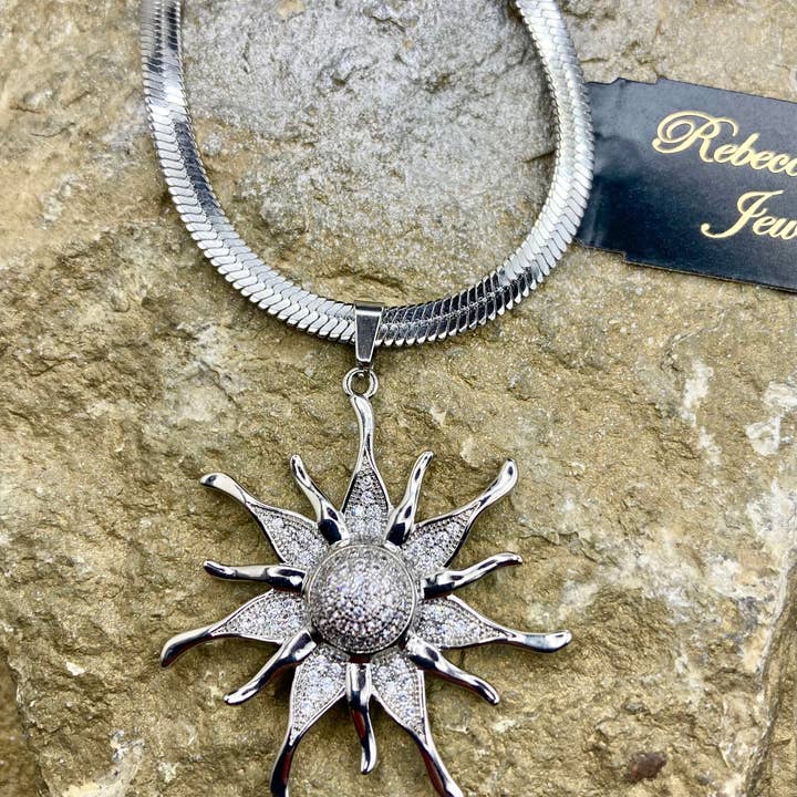 Rebecca Ray Jewelry - Wholesale Pendant/Charm Necklace - Gold Herringbone Necklace with Crystal Sun Celestial Pendant1