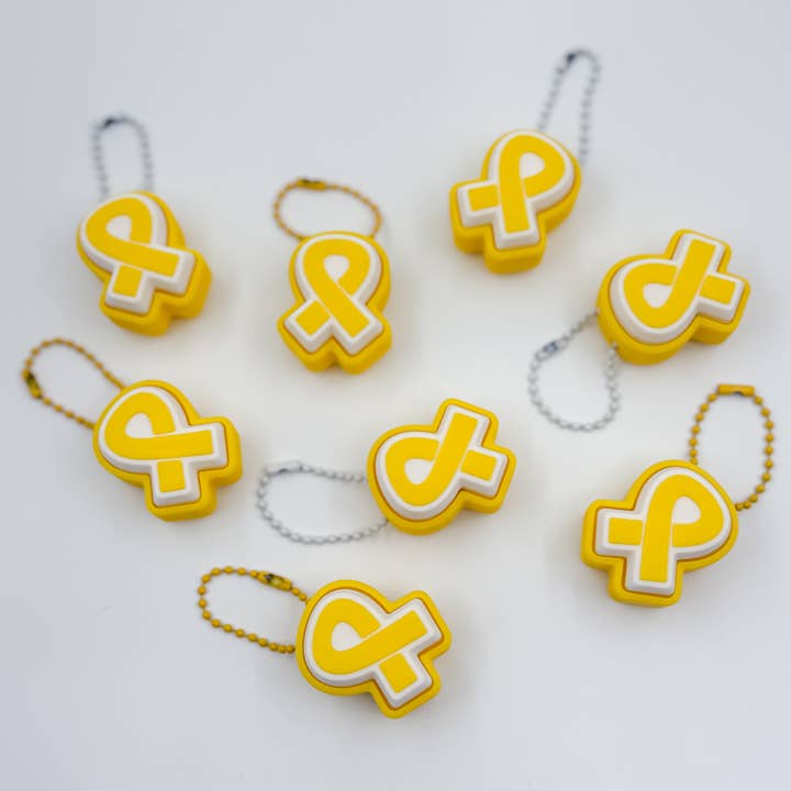 3D Printed Cancer Awareness Ribbon Keyboard Clicker Fidget for wholesale by Lauren Ann Boutique & Designs