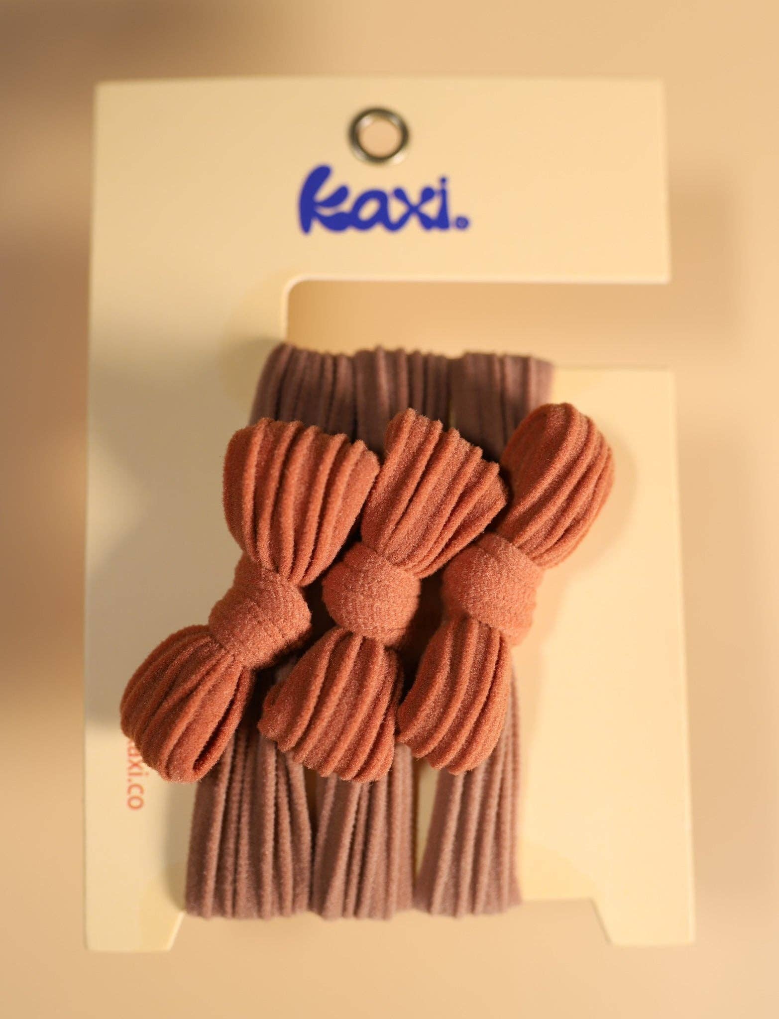 KAXI – wholesale Hårsnoddar – Dam – Tvåfärgade rosetter med bakåtslickat hårband11