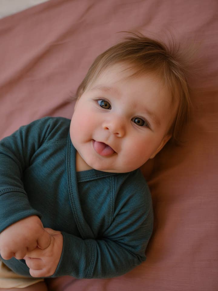 Baby wrap sweater – Merino wool - Orion Blue for wholesale by Lille Barn