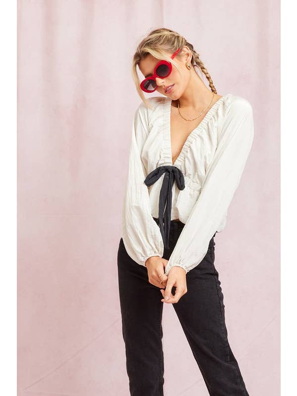 Ivory Poly Contrast Bow Top for wholesale on Faire2