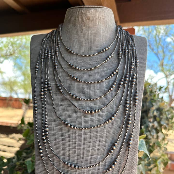 Handmade Graduated Sterling Silver Graduated Bead Beaded Necklace and other Purchase Wholesale silverbirch. Free Returns & Net 60 Terms on Faire trending on Faire.