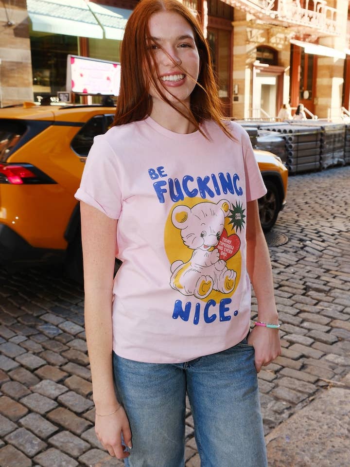 Pink Be F*ing Nice Graphic T-Shirt for wholesale on Faire1