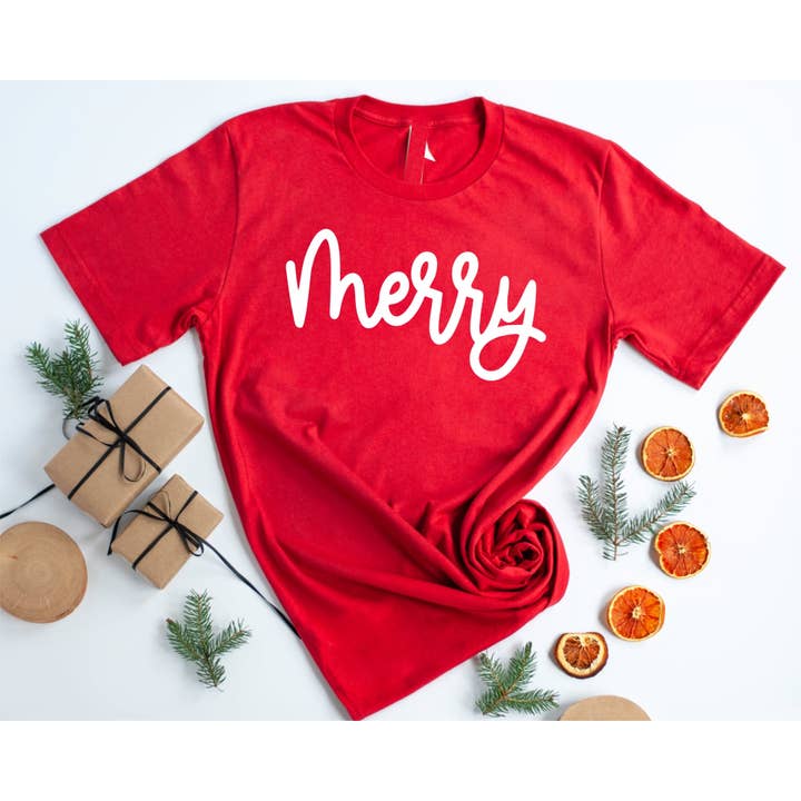 Christmas 2025 Red Merry Script Holiday Graphic Tee for wholesale by Fox and Owl Apparel