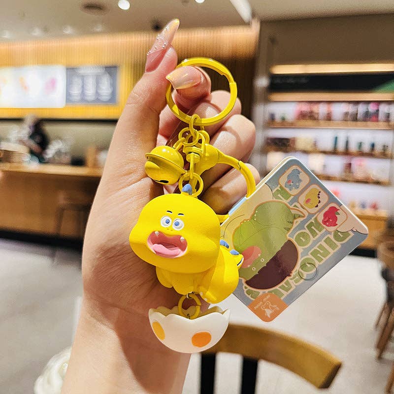 KiddieKickz – wholesale Keychain – Child – Cartoon Dinosaur Holding Egg PVC Soft Keychain4