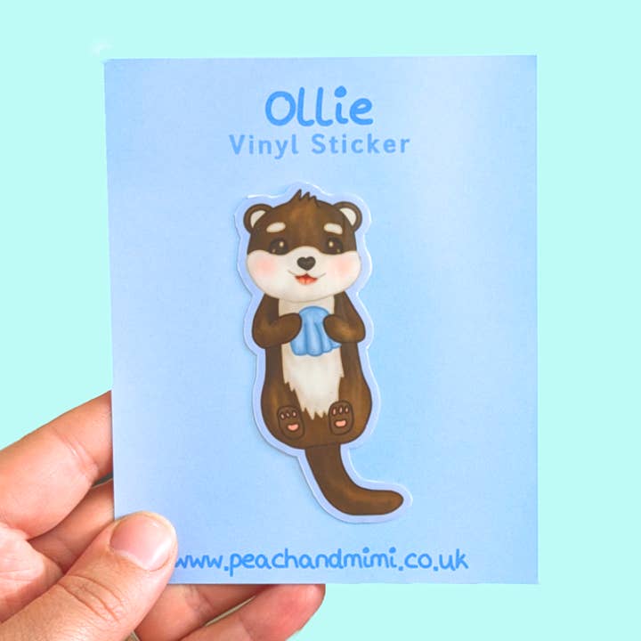Ollie the Otter Vinyl Sticker for wholesale by Peach and Mimi