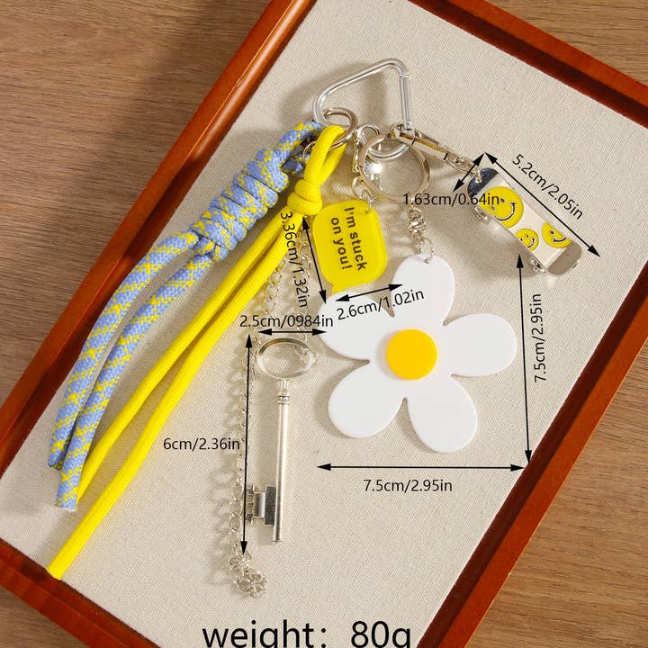 White Mini Skateboard Keychain with Daisy & Letter Charm_CWMM7551 for wholesale on Faire3