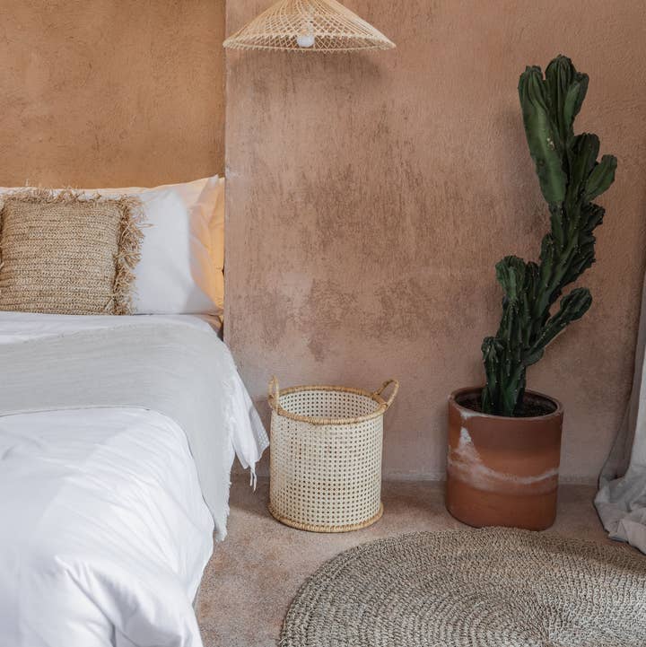 Woven Rattan Lighting Pendant for wholesale by Village Thrive