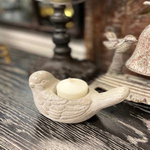 Purchase Wholesale bird candle. Free Returns & Net 60 Terms on Faire