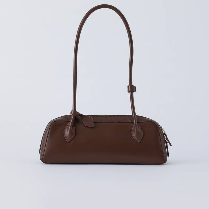Remy Barrel Bag - Chocolate and other Purchase Wholesale leather product. Free Returns & Net 60 Terms on Faire trending on Faire.