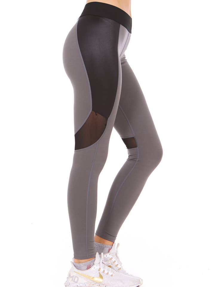 Therapy Exposed Elastic WaistBand Active Legging with Shiny PU Knit Vertical Leg Insert and Rear Knee Mesh Insert for wholesale by Therapy