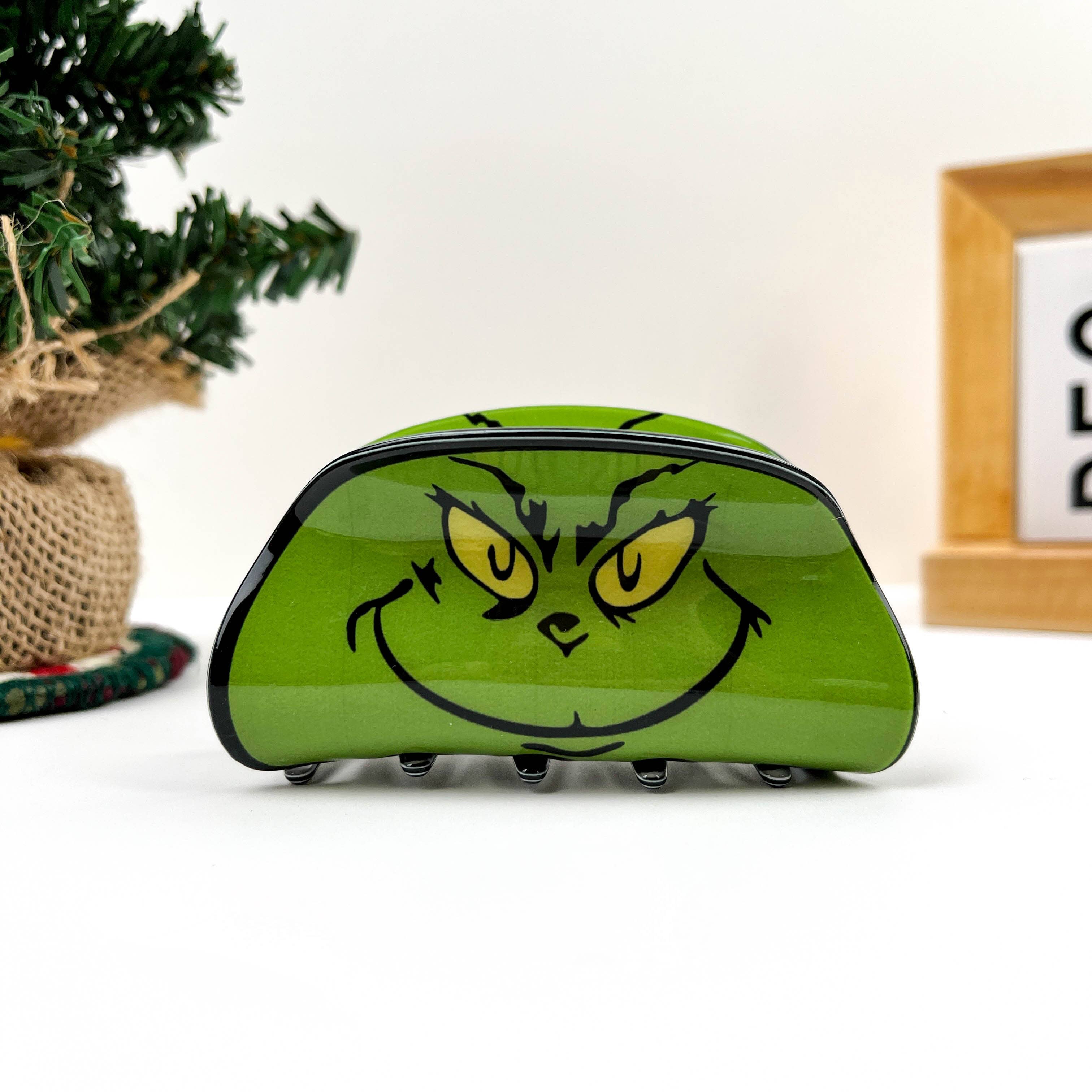 Groen Green Goblin gezicht haarclip met klauw voor groothandel op Faire1