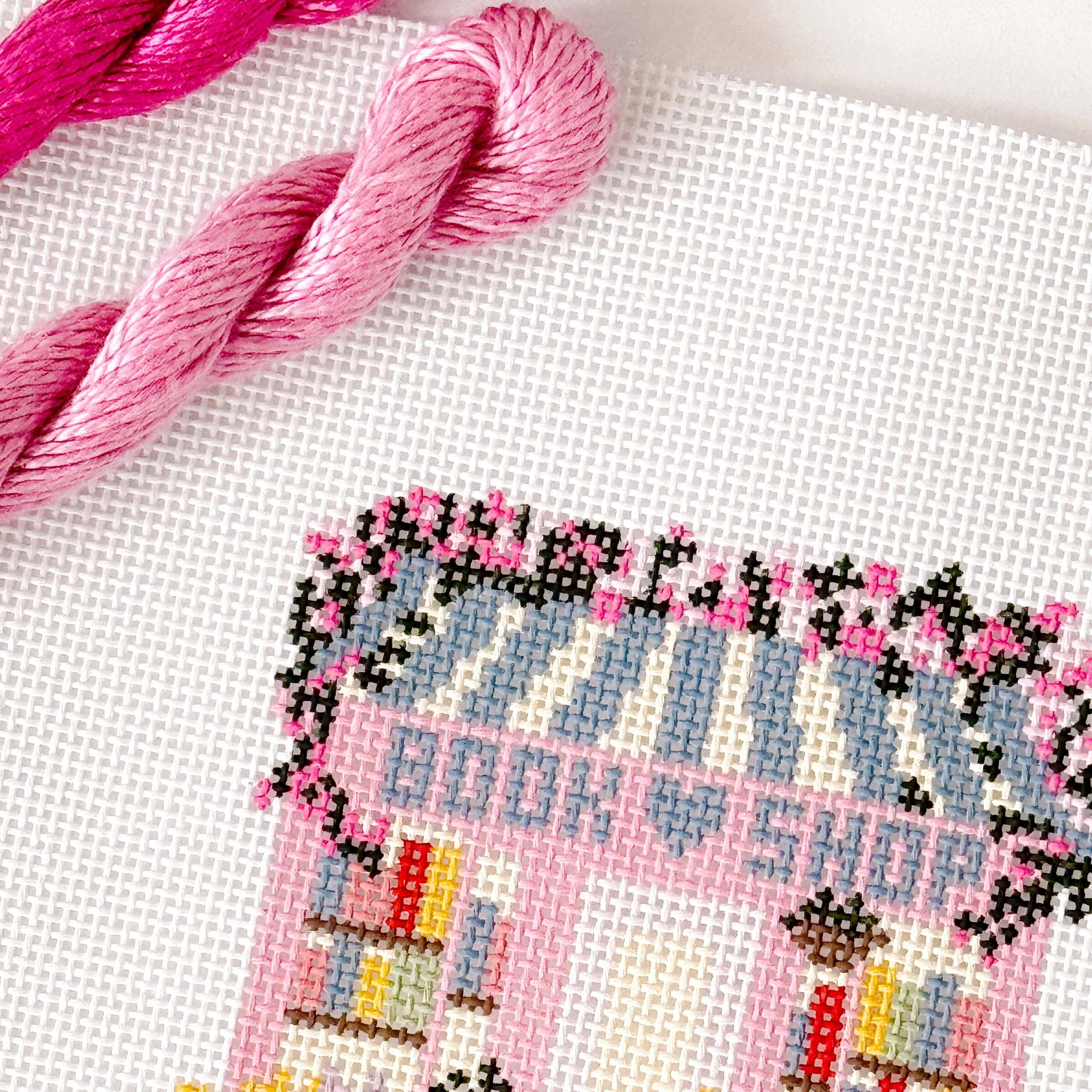 Cotswold Co Designs - Wholesale Embroidery/Cross Stitch Supplies - Ready to Ship Hand Painted Book Shop Storefront 6” Needlepoint Canvas 13 Mesh Reading Needlepoint Canvas Storefront Hand Painted2