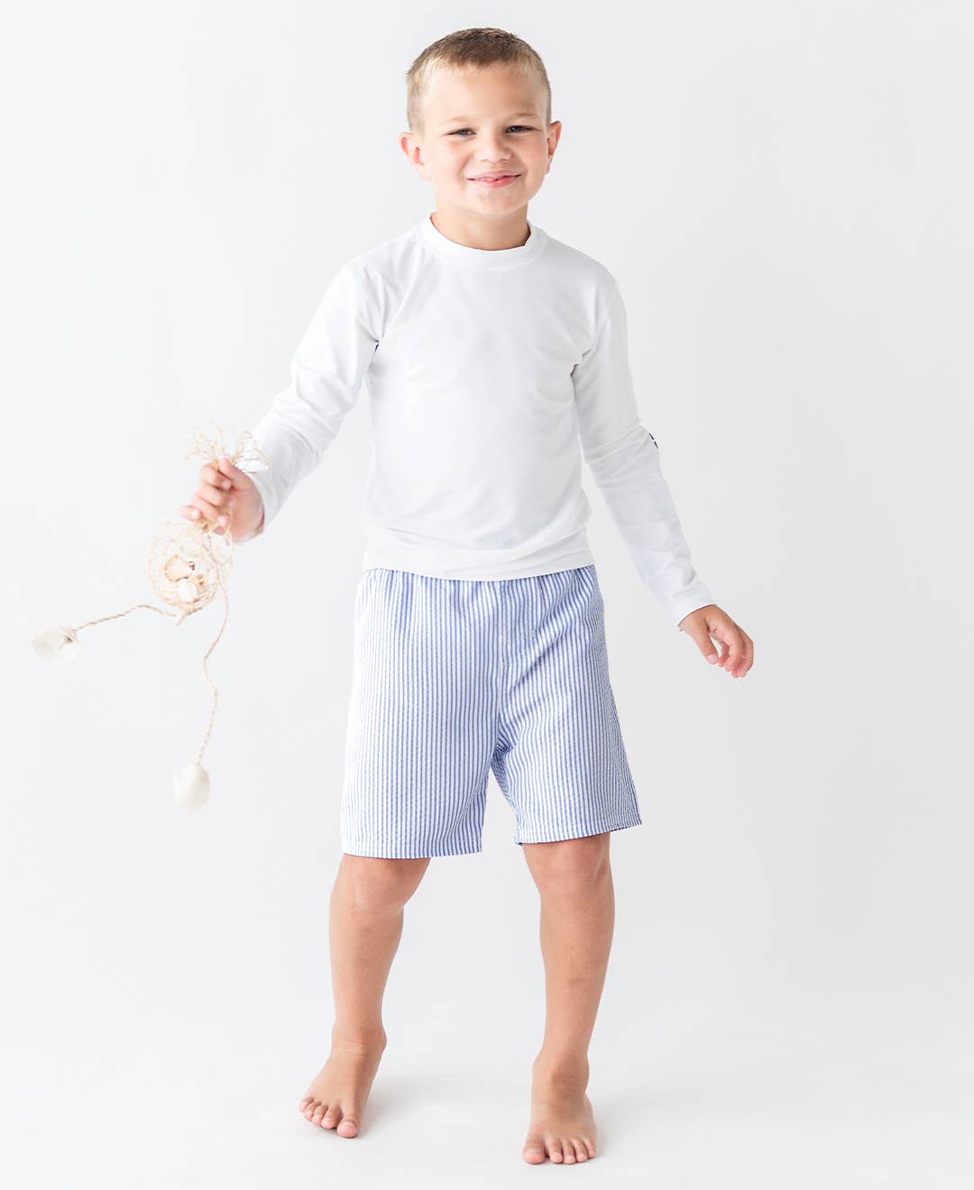 Boys Periwinkle Blue Seersucker Swim Trunks for wholesale on Faire4