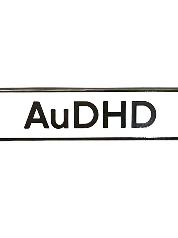 AuDHD Communication Enamel Pin for wholesale by Retrophiliac