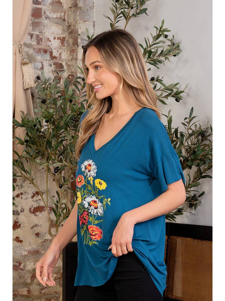 Teal Oversized V-neck Graphic Short Sleeve Top for wholesale on Faire
