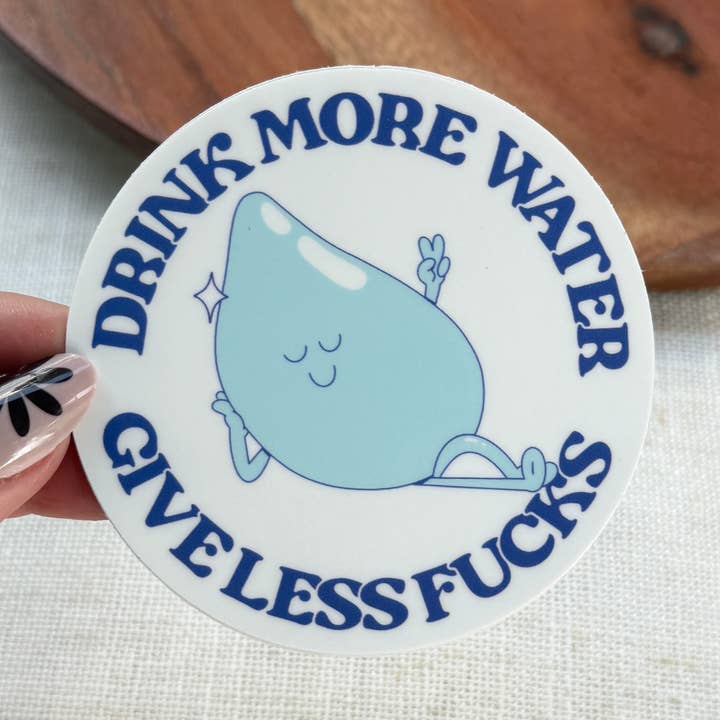 "Drink more water, give less fucks" Sticker for wholesale by Big Moods