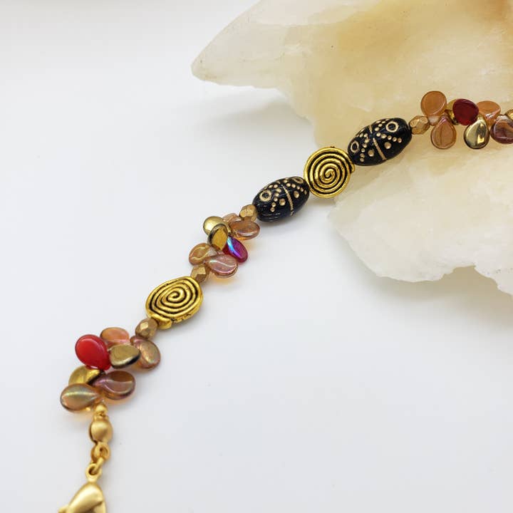 Discoveries, Inc. – wholesale Beaded bracelet – Klimt Inspired Gold Spiral Bracelet2