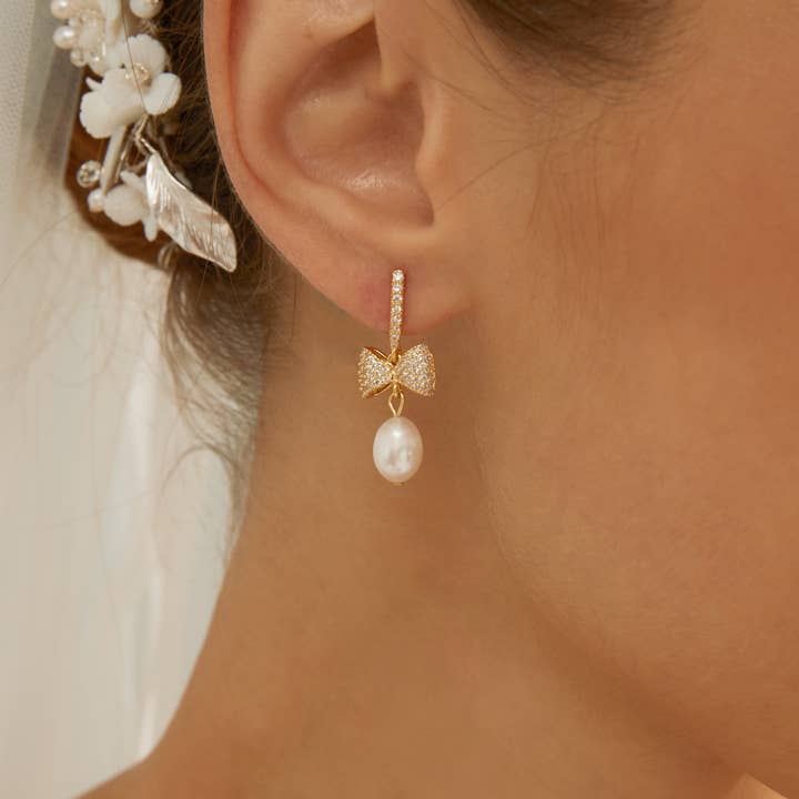 Goldene Schleifen-Perlenohrringe mit Diamant, Süßwasserperle für den Großhandel von Drrtymagic