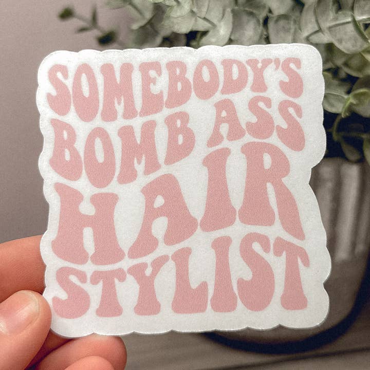 Somebody’s Bomb Ass Hairstylist Sticker for wholesale by Your Average Moms