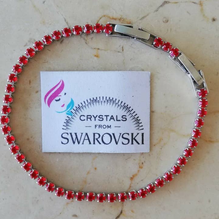 Bracelet tennis très fin en argent et rubis pour la vente par HTB