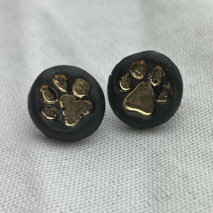 Black and Gold Paw Print Studs for wholesale by Nala Studio