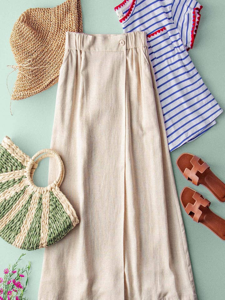 Bohemian Button Front Wrap Around Elastic Waist Maxi Skirt for wholesale by Urban Daizy