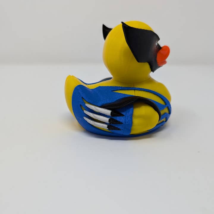 Giant Turtle Creations – Estatueta decorativa por atacado – Patos Deadpool e Wolverine1