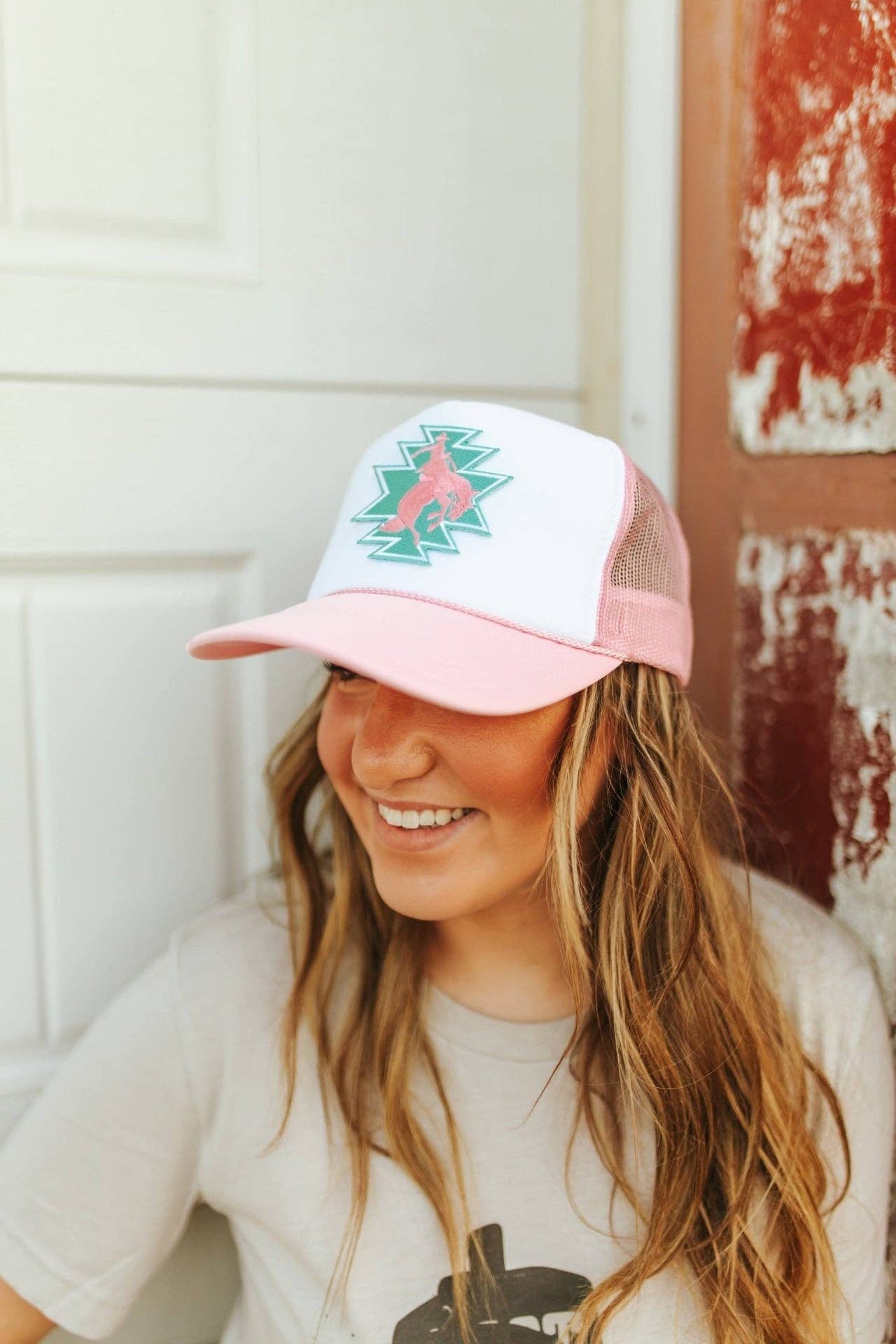 Pink White Aztec Bucking Bronco Patch Trucker Hat for wholesale on Faire1