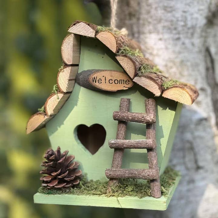 Marissa's Gifts - Wholesale Bird House - Handmade wooden coloured birdhouse hut with adorable heart shaped bird hole and ladder. The measurements are 17 x 11.5 x 17cm5