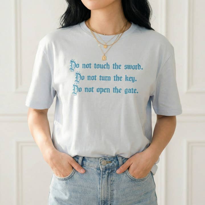 Quicksilver Bok T-shirt för wholesale av MagicMerchEmporium