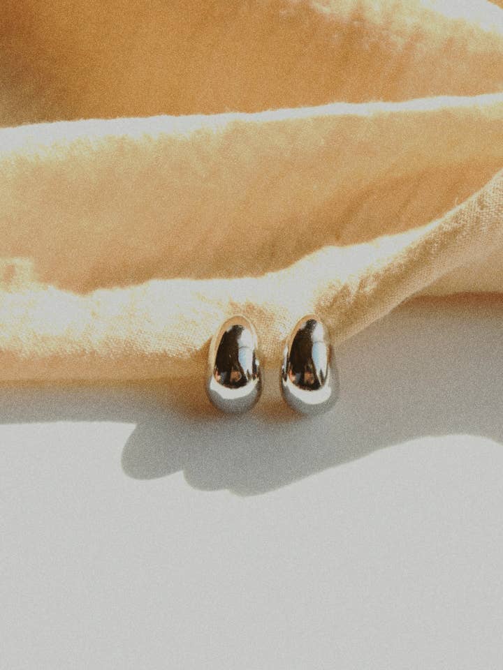 BUBBLE Huggie Hoops - Silver for wholesale by Goldie Jewelry