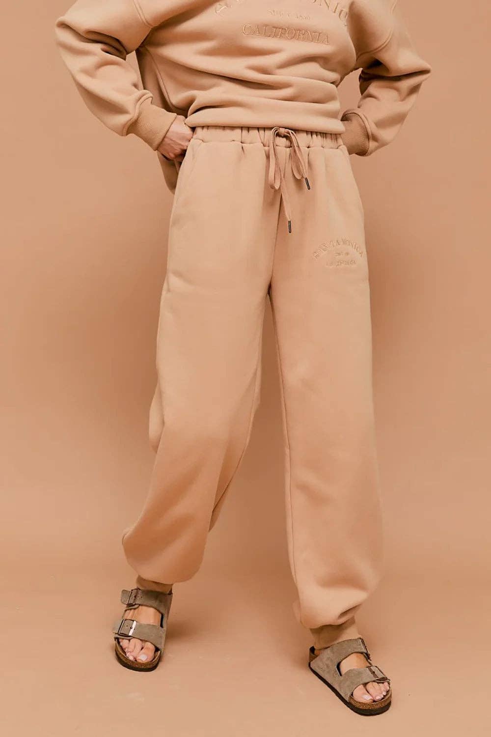 Beige "Santa Monica California" Embossed Graphic Elastic Waist Drawstring Joggers for wholesale on Faire2