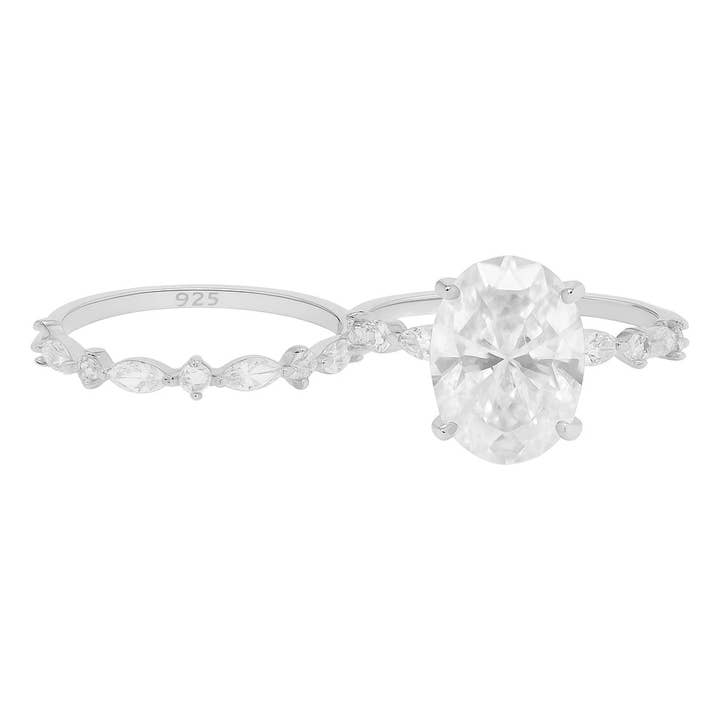 Ensemble de bagues de mariage en argent sterling avec moissanite ovale de 4,5 ct et accents marquise flottants pour la vente par Atlanta Jewelers Supply