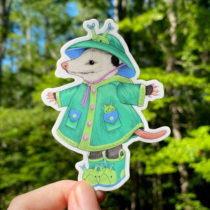 Raincoat Opossum Weatherproof Vinyl Sticker for wholesale by Allison Stoiser Art