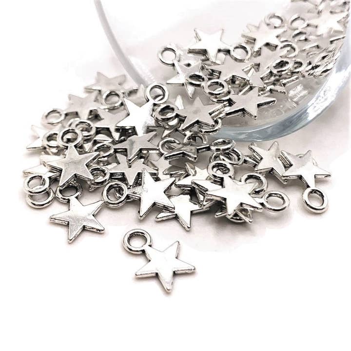 Petits pendentifs étoile en argent vieilli, 8x11mm pour la vente par Guerrilla Charm
