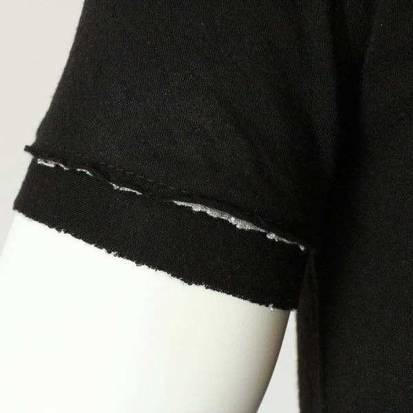 Polo nera | PUTTMEISTER per la vendita all'ingrosso da parte di labelswelove